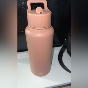 Brand new Simple modern water bottle in color mauve 32oz